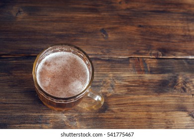 Mug Of Beer Vintage Background Top View