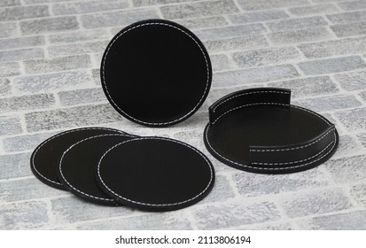 Mug Coaster Set, PU Leather Business And Office Gifts. Round Mug Coasters Of 6 Pieces Made Of Leather. Classical Gift And Give-away For Corporate Companies. Office And Business Gifts. Luxury Gifting.