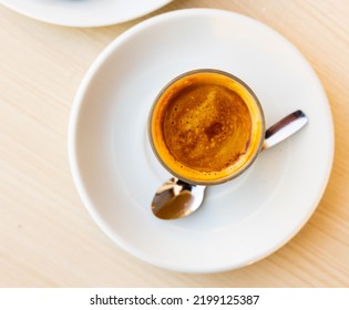 Mug Of Cortado Served On Table In Cafe. Traditional Spanish Coffee.