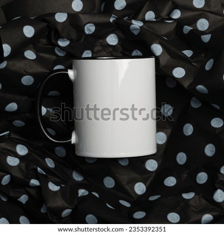 Mug mockup isolated on black background. White black blank cup for your design. Empty mockup template on a black table