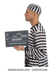 Mug Shot Of Prisoner In Striped Uniform With Board On White Background, Side View