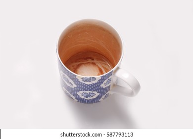 mug which is stained inside from tea