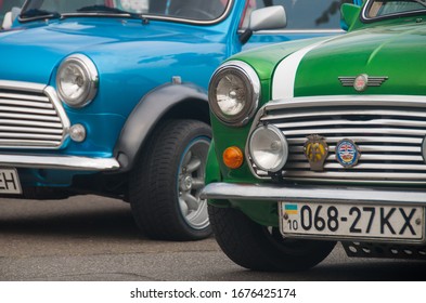 Mugello, Italy - May, 2013: Classic Austin Mini Cooper retro vehicles parked at the International Mini Meeting 2013 in Mugello, Italy. Background with vintage cars. - Shutterstock ID 1676425174