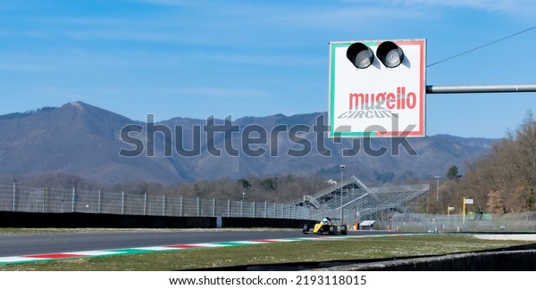 Mugello motor sport circuit banner landscape view\
with mountains panoramic background and car racing. Mugello, Italy,\
march 25 2022. 24 Hours\
series