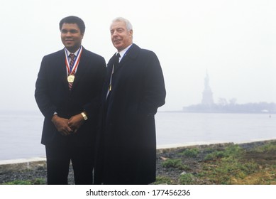 Muhammed Ali And Joe DiMaggio Wearing Gold Medals, Ellis Island, NY 