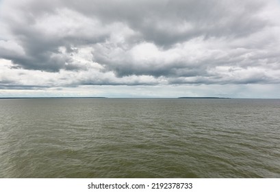 Muhu Strait, Estonia, Baltic Sea. Dramatic Sky, Storm Clouds, Water Surface Texture. Panoramic View. Nature, Eco Tourism, Weather Themes;