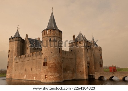 Muiderslot castle in Muiden Netherlands 14th century historic building architecture for defence. Fort is now museum and place of interest for tourists to visit and learn Dutch history in Holland