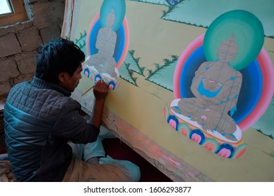 Mulbekh, India, Jun 2019, Young Tibetan artists form sculptures and paintings at the new Buddhist temple in Ladhak.