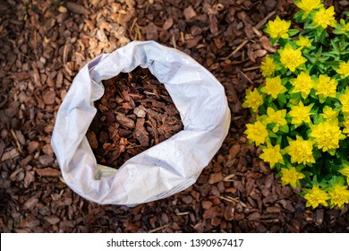 Mulching Flower Bed With Pine Tree Bark Mulch