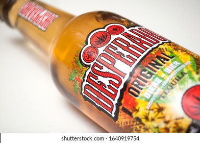 Mulhouse - France - 10 February 2020 - Closeup of Desperados bier on white background, desperados is the famous brand of mexican bier with tequila