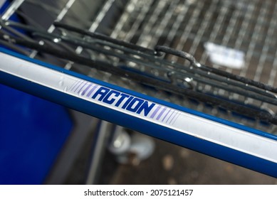 Mulhouse - France - 14 November 2021 - Closeup Of Action Supermarket Trolley In Front Of The Store Entry In The Street