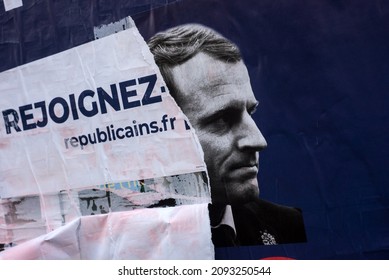 Mulhouse - France - 19 December 2021 - Torned poster by an angry citizen of Emmanuel Macron for the presidential elections 2022