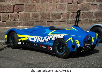 Mulhouse - France - 26 June 2022 - Profile View Of Blue Soapbox Car Parked In The Street After The Race 