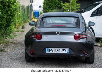 Mulhouse - France - 3 June 2022 - rear view of new Mazda MX5 parked in the street