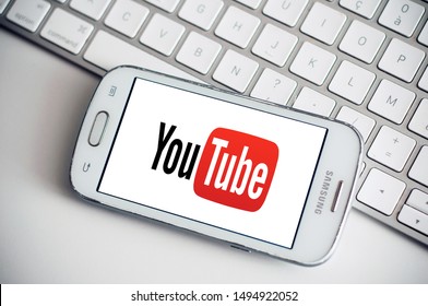 Mulhouse - France - 3 September 2019 - Closeup Of You Tube Logo On Smartphone Screen From Samsung Brand On White Keyboard Background