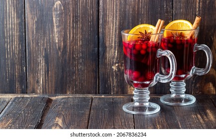 Mulled wine with cinnamon, cranberry and orange. Hot drink. Winter