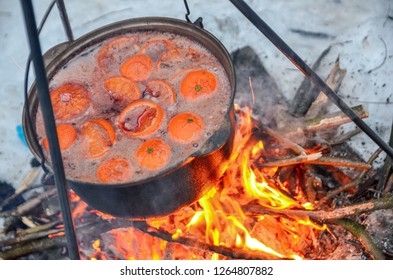 Mulled Wine Cooked On Fire Outside.