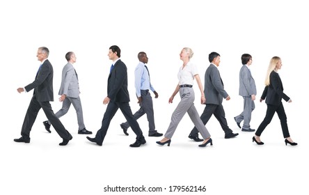 Mullti-ethnic Group of Business People Walking - Powered by Shutterstock