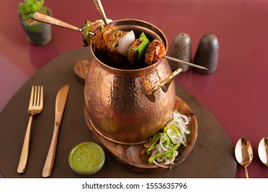 Multani Paneer Tikka Panner Platter Barbeque Tikka With Onion Pepper Lemon Serving In Copper Dish Top View 