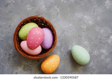 Multi clored  Polka dots Easter eggs in a basket
