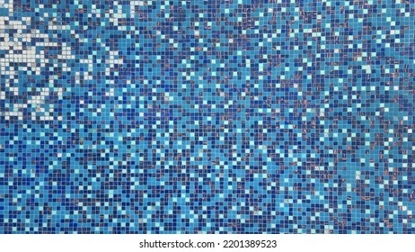 Multi Color Of Blue Texture Pool Tile. Blue And White Mosaic Floor Tile For Swimming Pool Finishing. Summer Concept Background. Texture Of Water Surface In Overhead View.