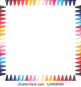 Multi color pastel(crayon) pencils border isolated on white with clipping path and copy space for text in the center