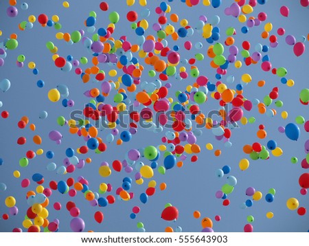 Multi colored balloons on a blue sky    