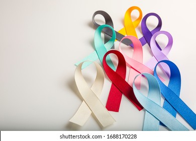 Multi colored cancer ribbons Proudly worn by patients, supporters and survivors for world cancer day. Bringing awareness to all types of cancer - Shutterstock ID 1688170228