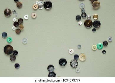 Multi Colored Clothes Sewing Buttons on Gray Background
