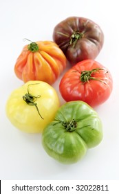 Multi Colored Heirloom Tomatoes Isolated On White Background