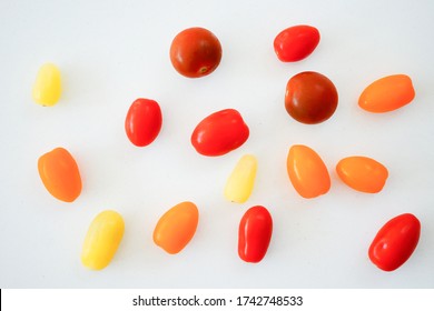 Multi Colored Organic Tomatoes On A Quartz Worktop