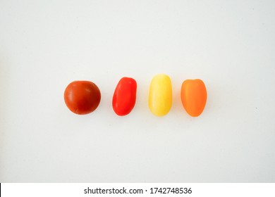 Multi Colored Organic Tomatoes On A Quartz Worktop