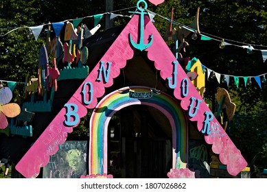 Multi Colored Playhouse Diy Made From Wood And Bright Colored Paint.