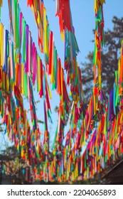 Multi Colored Ribbon Backdrops Are Hung To Represent Lgbtq Community To Call For Queer Equality And Rainbow Backdrop Formed By Multi Colored Ribbons And Copy Space For Messages. LGBT Concept