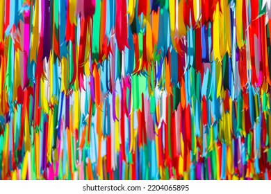 Multi Colored Ribbon Backdrops Are Hung To Represent Lgbtq Community To Call For Queer Equality And Rainbow Backdrop Formed By Multi Colored Ribbons And Copy Space For Messages. LGBT Concept