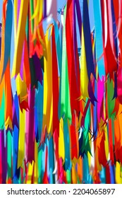 Multi Colored Ribbon Backdrops Are Hung To Represent Lgbtq Community To Call For Queer Equality And Rainbow Backdrop Formed By Multi Colored Ribbons And Copy Space For Messages. LGBT Concept