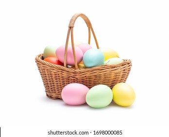 Multi colors Easter eggs in the woven basket isolated on white background with clipping path. Pastel color Easter eggs. - Shutterstock ID 1698000085