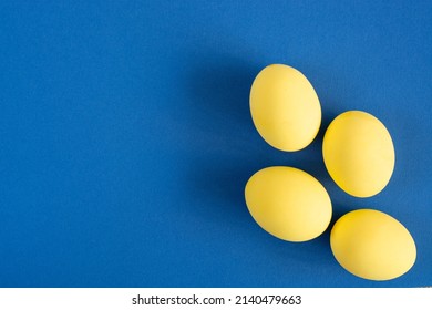 Multi Colors Painted Easter Eggs In Colors Flag Of Ukraine Yellow And Blue. Happy Easter Holiday Card	
