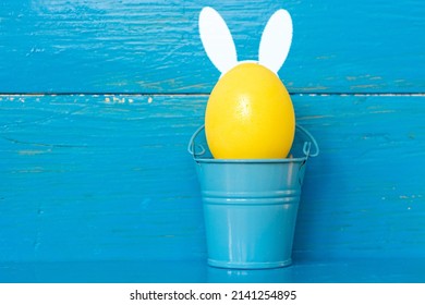 multi colors painted easter eggs in colors flag of ukraine yellow and blue. Happy Easter holiday card	
