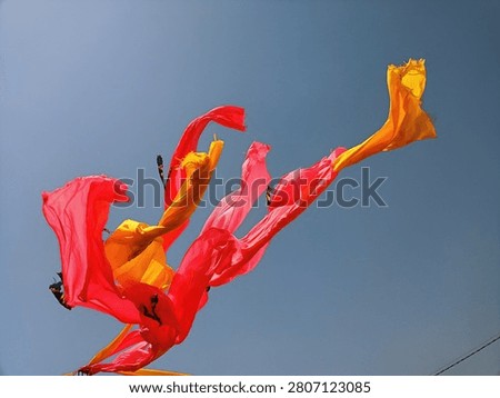 multi colour cloth waving in a wind.