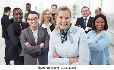 Multi ethnic business people with arms crossed