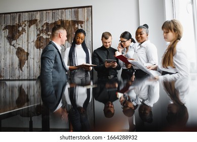 Multi ethnic business people, entrepreneur, business, small business concept - Shutterstock ID 1664288932