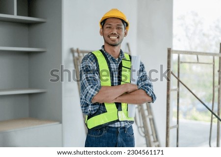 multi ethnic engineer brainstorming and measuring for cost estimating on paperworks and floor plan drawings about design architectural and engineering for houses and buildings.