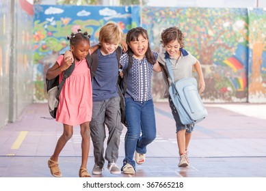 Multi Ethnic Group Of Children Playing Together. Success And Integration Concept.