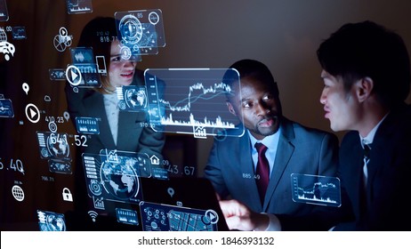 Multi Ethnic People Meeting In Dark Room. Business And Technology Concept. Smart Office. GUI (Graphical User Interface).