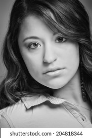 Multi Ethnic Young Woman Serious Expression Portrait, Black And White Headshot 