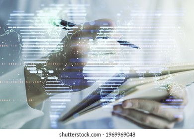 Multi exposure of abstract creative digital world map and man hand writing in notebook on background, tourism and traveling concept
