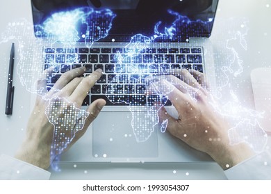 Multi exposure of abstract creative digital world map and hands typing on computer keyboard on background, tourism and traveling concept