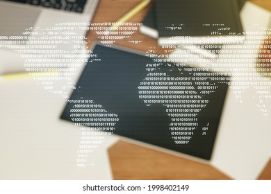 Multi exposure of abstract creative digital world map and digital tablet on background, top view, research and analytics concept