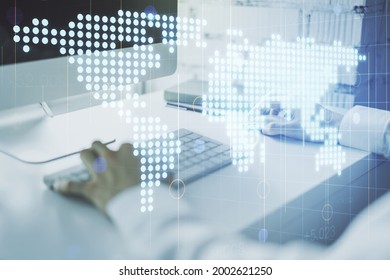 Multi exposure of abstract creative digital world map and hand typing on computer keyboard on background, research and analytics concept